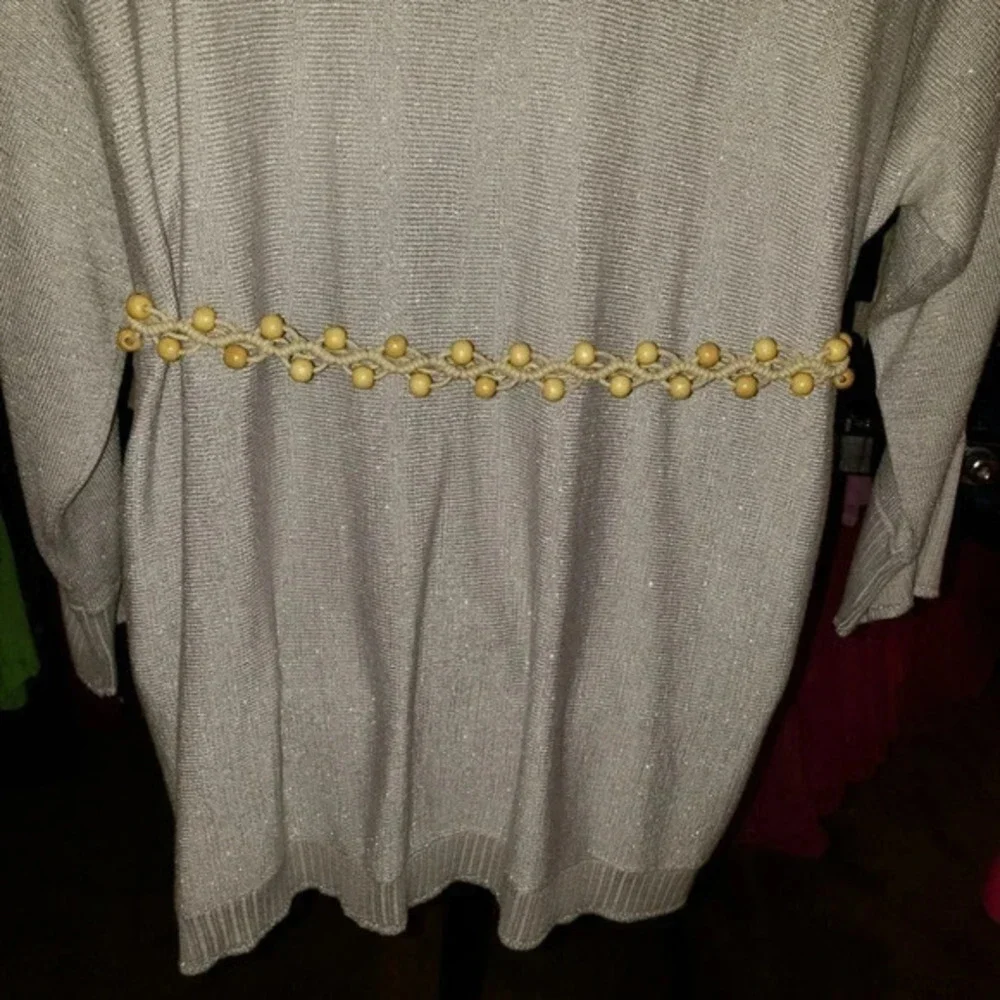 Beaded belt with tassels in‎ cream